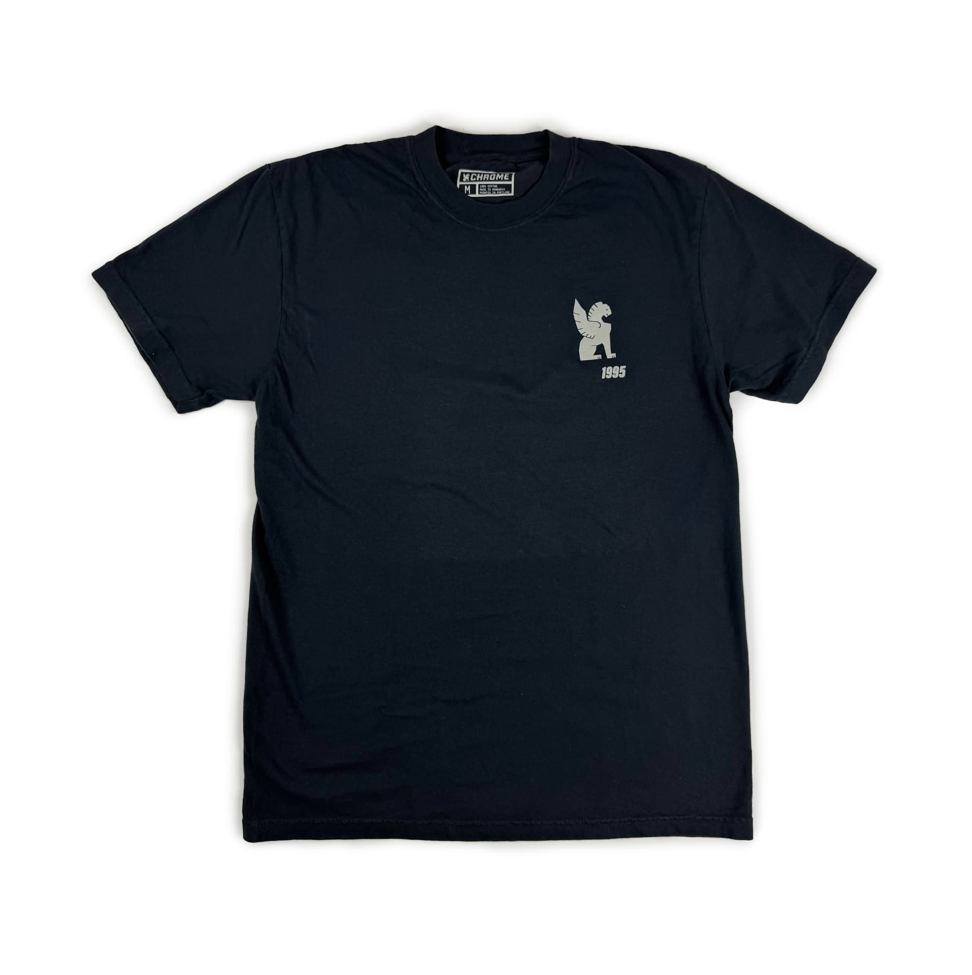Black t-shirt with a small white chrome logo on the chest against a white background #color_black